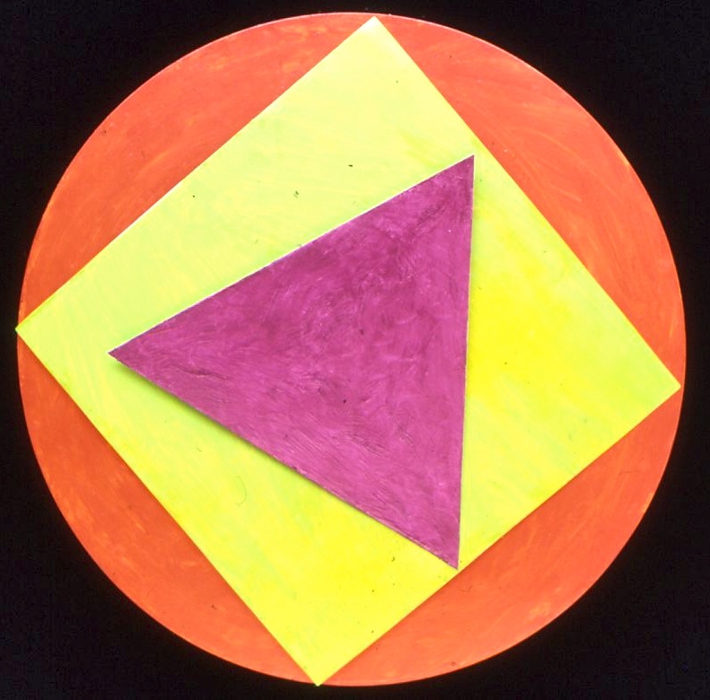 "Secondary Citizen" 1978 shapes mounted on clock motor, triangle seconds, square minutes and circle hour hands 12" cicle enamel on aluminum with clock motor