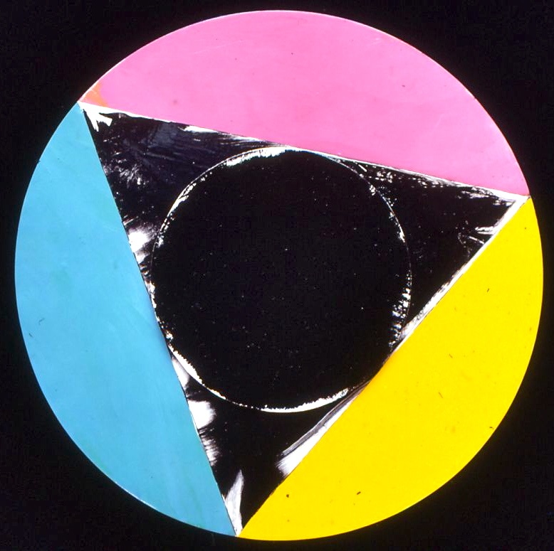 "Primary at Night" 1978 12" cicle enamel on aluminum outer circle minutes hand inner circle second hand mounted on clock motor